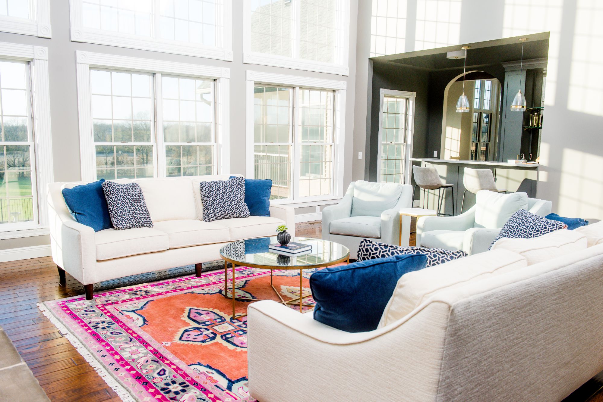 beautiful entertainment space with centerpiece rug