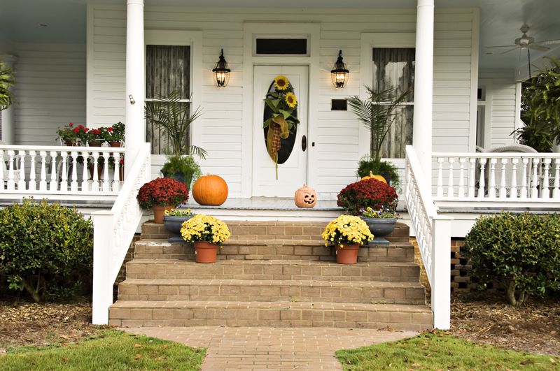 Front Door with Plenty of Pumpkins