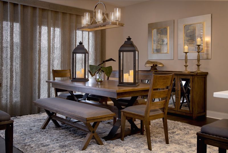 Dining table with candle-like light fixtures