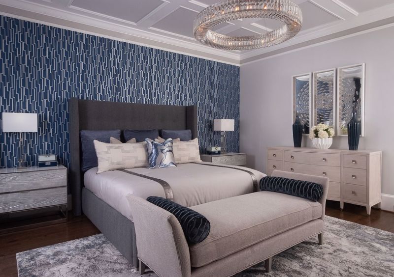 Bedroom decorated with pillows and blue decor
