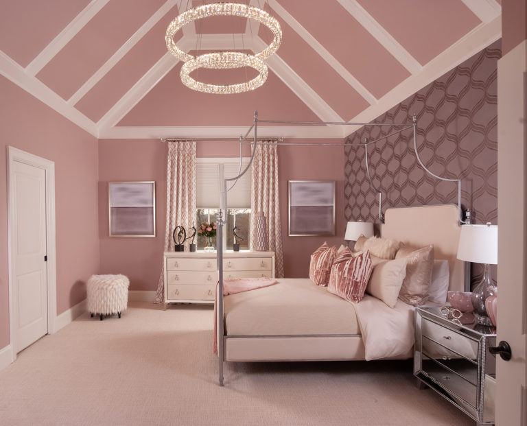 pink kids bedroom with chandelier