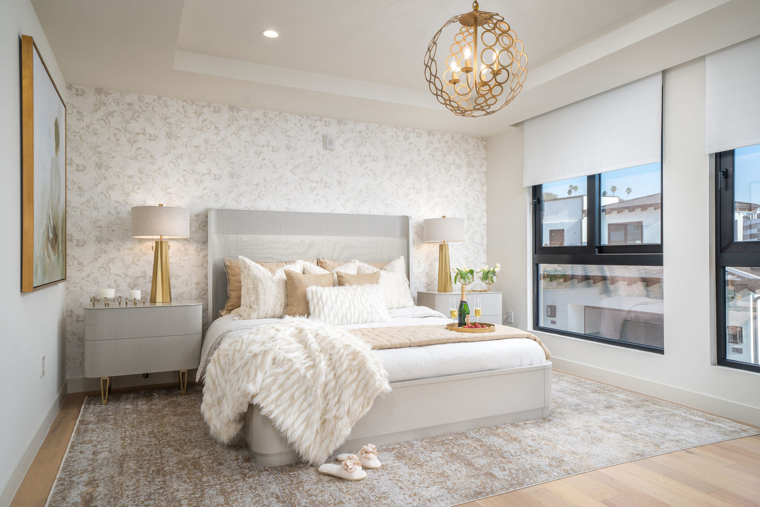Bedroom with white and tan bedding