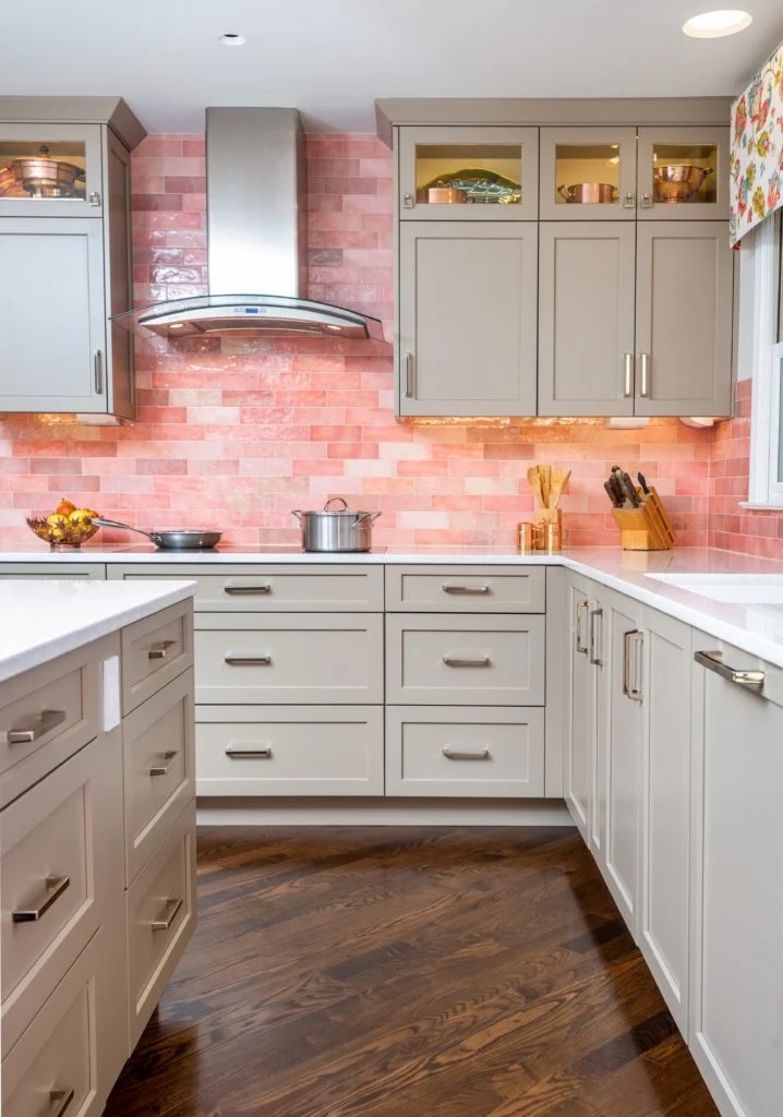 Kitchen with pink tile walls