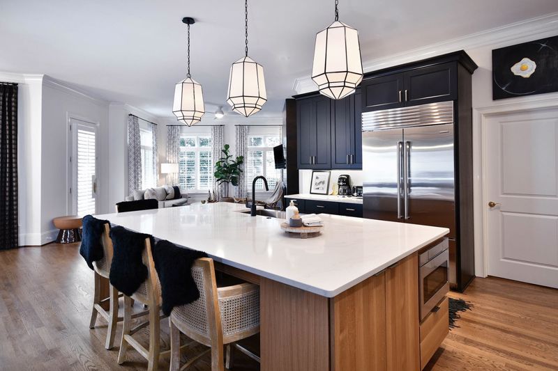 kitchen countertop illuminated with hanging lights