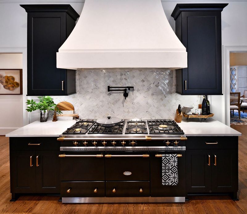 black cabinets with white countertops for a kitchen stovetop in cincinnati