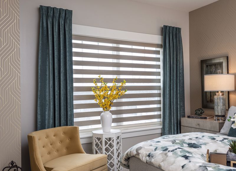 cerulean curtains with white hard blinds showcasing a mix of hard and soft window treatment options in cincinnati