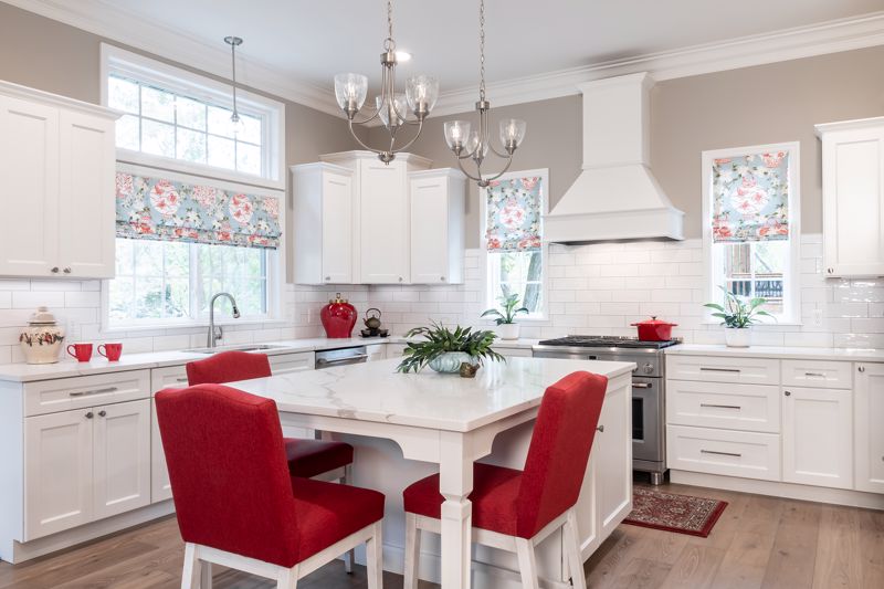 scarlet upholstery and small breakfast nook kitchen island cozy interior design in Cincinnati